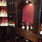 This is the arched wine rack seen from outside the wine cellar door.