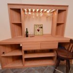 This decanting table was added to our rustic wine cellar design to cover the alcove space.