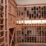 As you can see, the rustic wine cellar design involved a couple of storage configurations. In this photo you can see the standard 750 compartments, the reveal row, an X-bin, vertical shelves, and horizontal shelves (partially visible on the left).