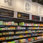 Some customers come into commercial custom wine cellars to buy ready-to-drink beverages, and the owner wanted to provide them with plenty of chilled options. You can grab a juice, soda, sparkling water, and more from this section!