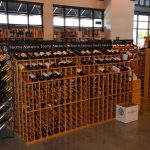All the racking inside this commercial wine cellar was custom-built. A lot of thought went into each design including ensuring every wine bottle is easily reachable by the customers.