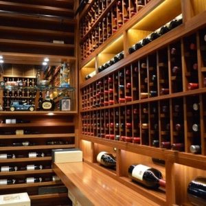 6 - Multiple racking styles give a contemporary feel to the wooden wine racking in this cellar. Contemporary Wine Cellar Expansion