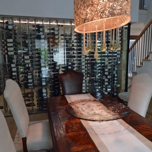 1 - A modern glass wine cellar in a beautiful California dining room. Glass Wine Wall in a Twin Peaks Dining Room