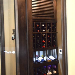 16 - This small wine cellar has a glass front that allows for easy bottle visibility.