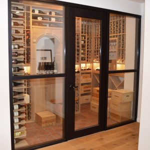 18 - Framed glass wine cellar walls and doors are a beautiful way to show off your precious and valuable wine collection.