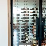 All the bottles in our modern wine cellar idea are fully visible from the outside.