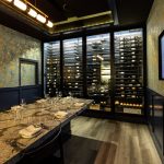 The builders of this modern wine display did not cheap out on this project. The use of luxury design materials like marble and wane's coating gives highlight to the value of the restaurant's wine collection. Luxury Wine Display With Modern Theme