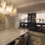 We maintained the elegant look of the entire room in our small wine cellar design.