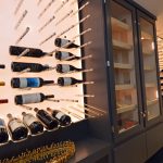 The wooden wine cabinet was also custom built on site for this small wine cellar.