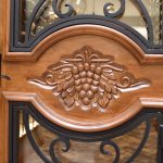 The wine cellar door was custom-made with hand carvings and iron detailing.
