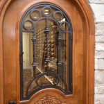 Glass panels allow visitors to get a sneakpeek of the our modern wine wall.