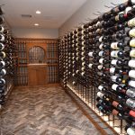 Although this wine room was big enough to house a central storage island, the owner opted to go purely for a wine wall design.