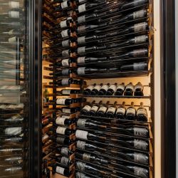 We also utilized metal to custom-build the wine racks, with some touches of wood.